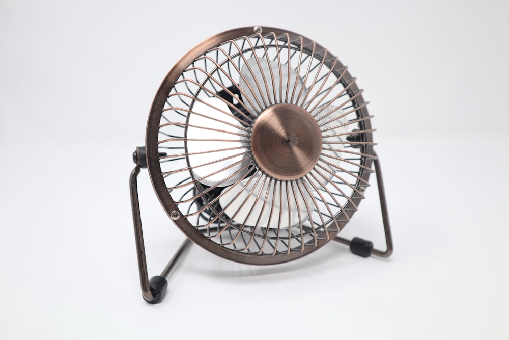 Compact budget desk fan on a desk